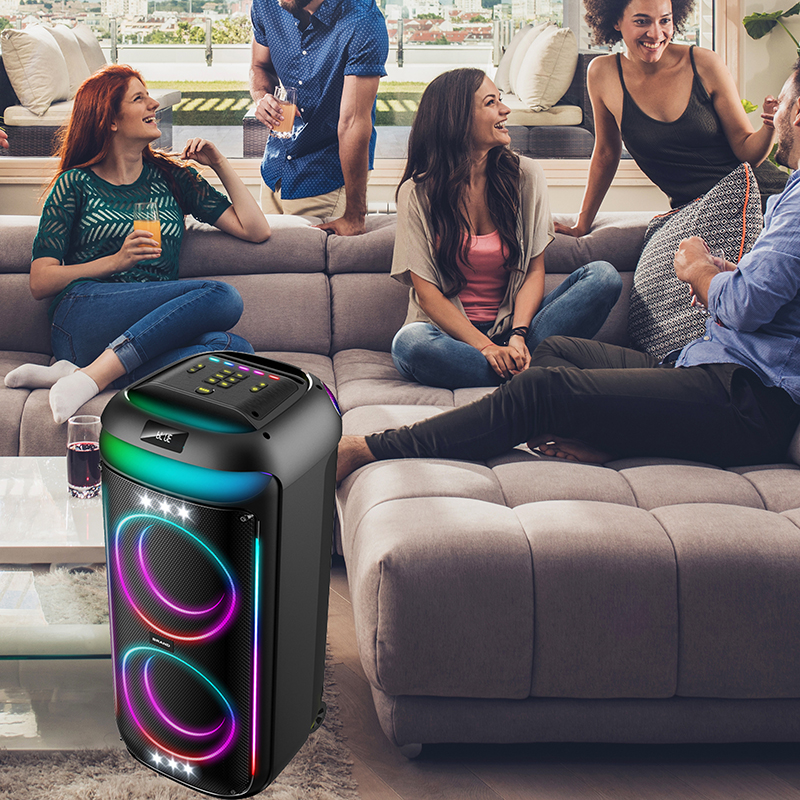 Large group of young adults relaxing in the apartment and talking among themselves.